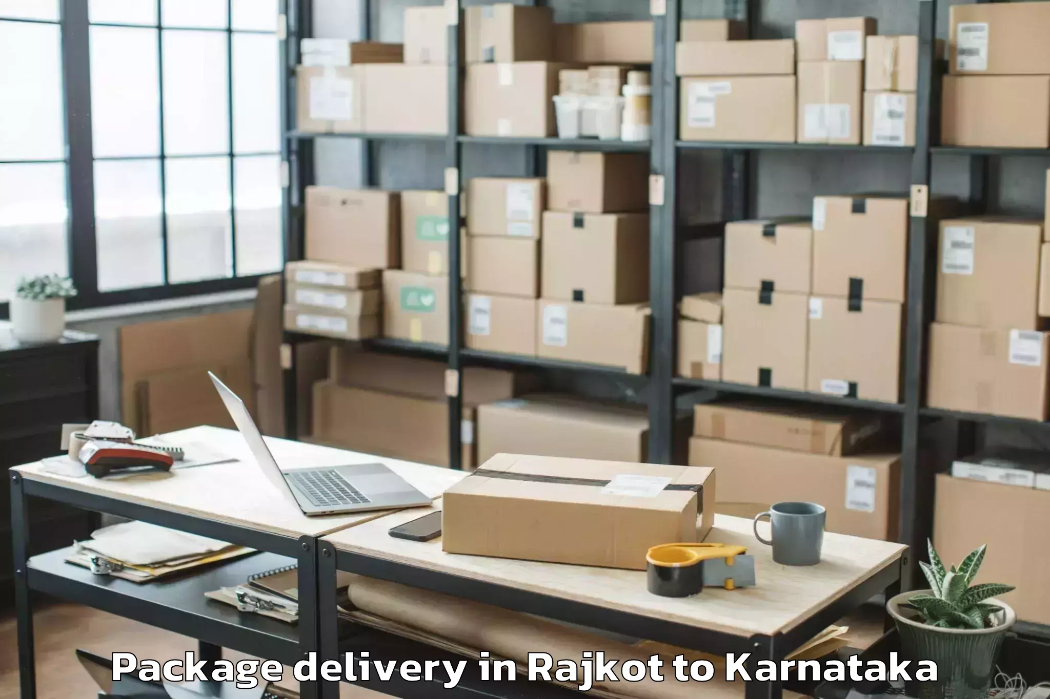 Book Your Rajkot to Karnataka State Akkamahadevi W Package Delivery Today